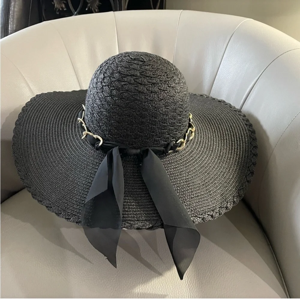 Marcus Adler New York black floppy hat with gold chain and sheer scarf accent